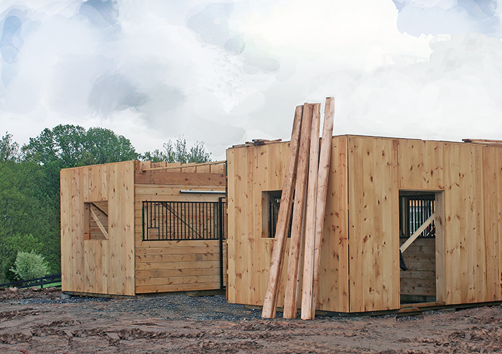 This photo shows two sections of the horse barn just delivered.